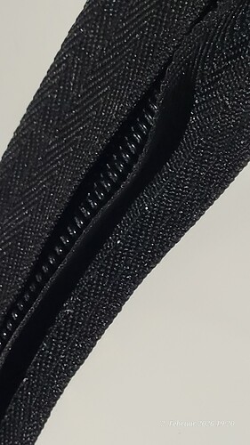 Here the fabric doesn't lie underneath in the inner window arch due to poor stitching